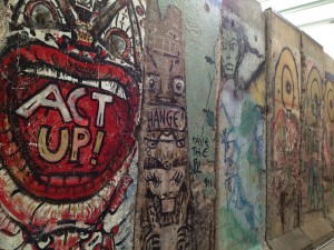 Graffiti adorns a piece of the Berlin Wall.