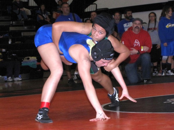 Junior Alyah Thomas competes at the NCS wrestling tournament. After struggling with a back injury all season, she still took third in her bracket. 