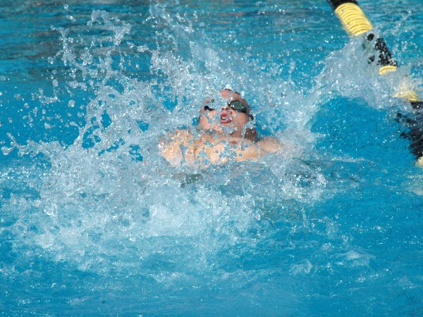 Senior Joey Tognolini swims at the WACC championship meet. Photo by Reyna Garcia/Copy Editor.