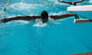 Erik Clemensen flies through the water during the swim meet. Picture by Robbie Brandt