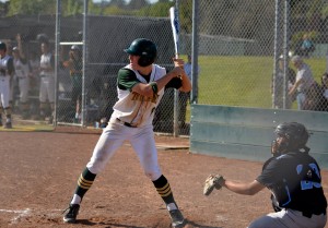 Brian Tognolini prepares to hit during an intense game. Photo by Jes Smith