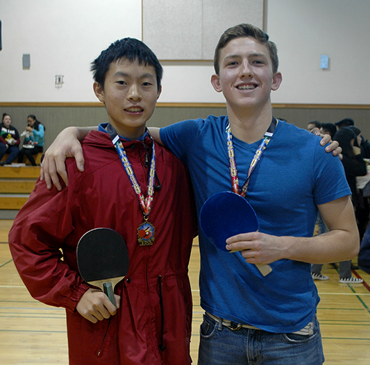 Brian Tognolini and Justin Tat pose for a picture after an intense match. Picture by Nina Bessolo