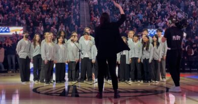 Madrigals make magical music at Warriors match